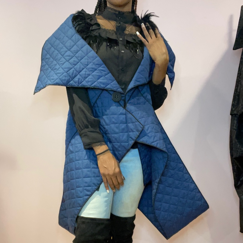 The  blue KVEST vest by Heydari‎